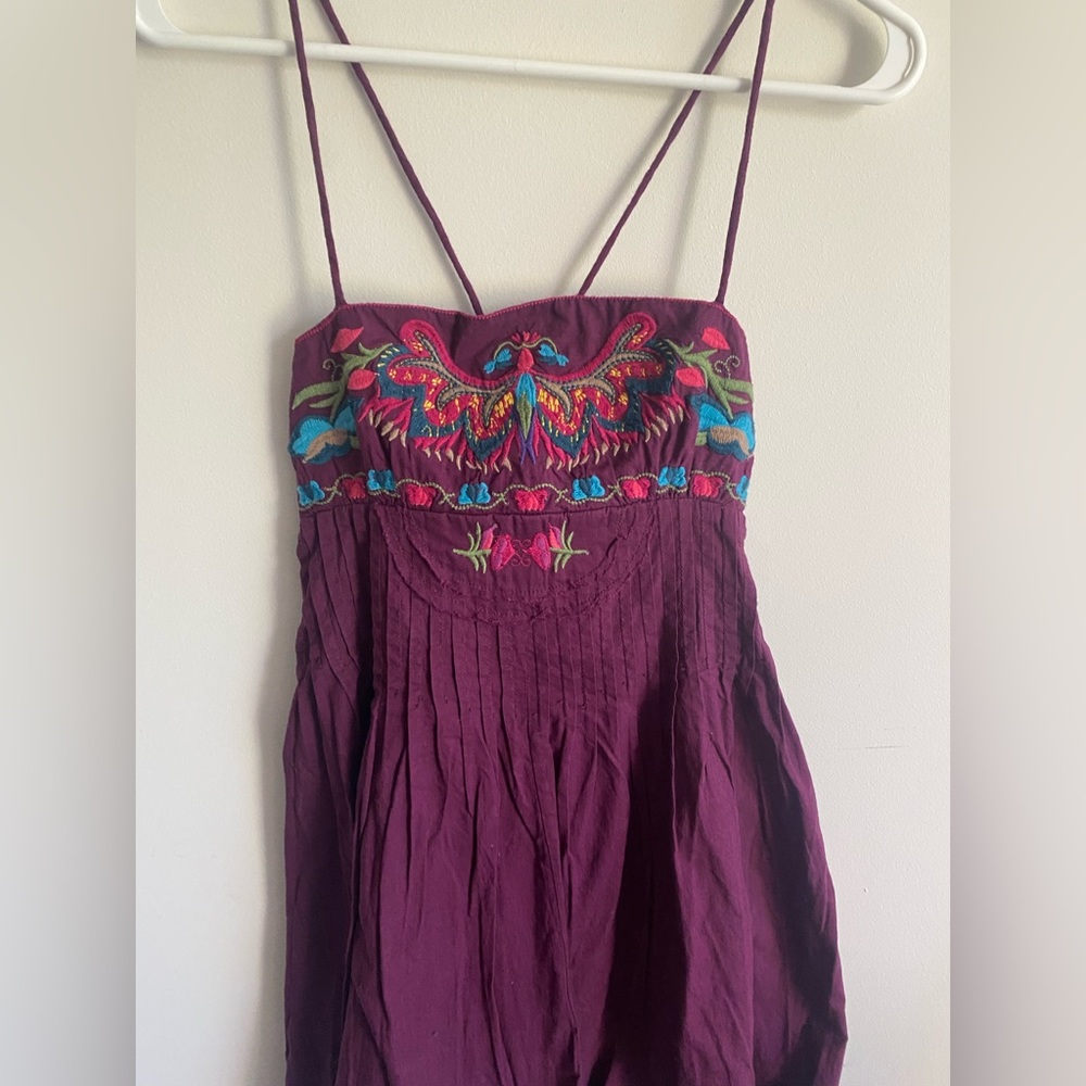 Looks like Free People but no tag. Cotton embroidered top fits med / lg